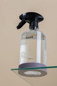 black and white plastic spray bottle